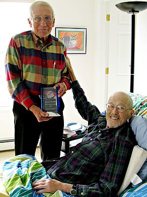 Bruce Laumeister of Bennington, Vt., the treasurer of HRPCA (standing), accepted the award on Howard Hansen's (sitting) behalf as his illness prevented travel to the event in Los Angeles. Here Bruce presents the award to Howard at Howard’s home in mid-S